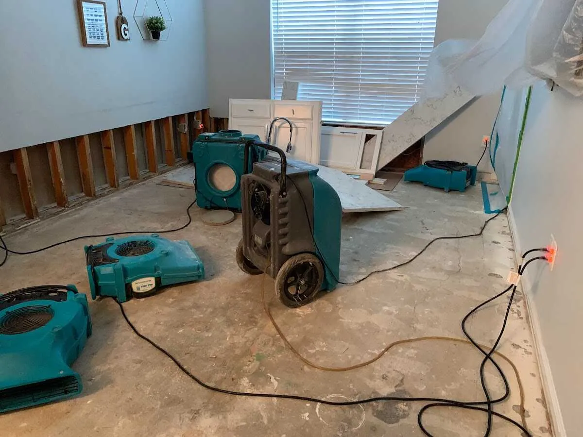 Dehumidifier in flood-cut room for Water Damage Restoration in Bayonne